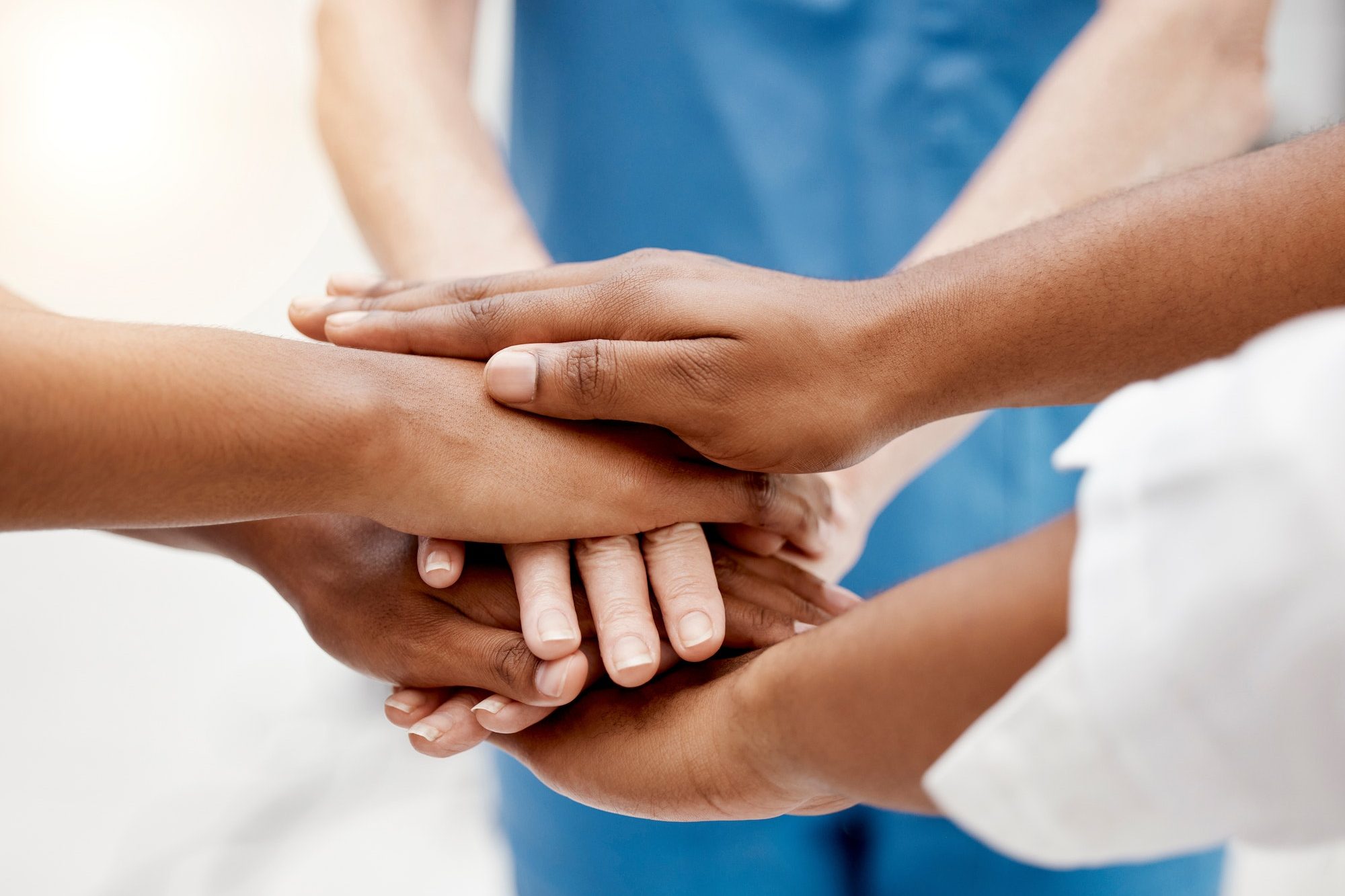 Hands, team and doctors, health collaboration with diversity in healthcare and teamwork for partner
